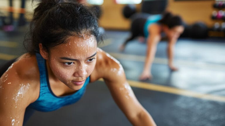 woman sweating during interval training