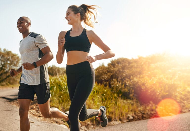 two people jogging outside